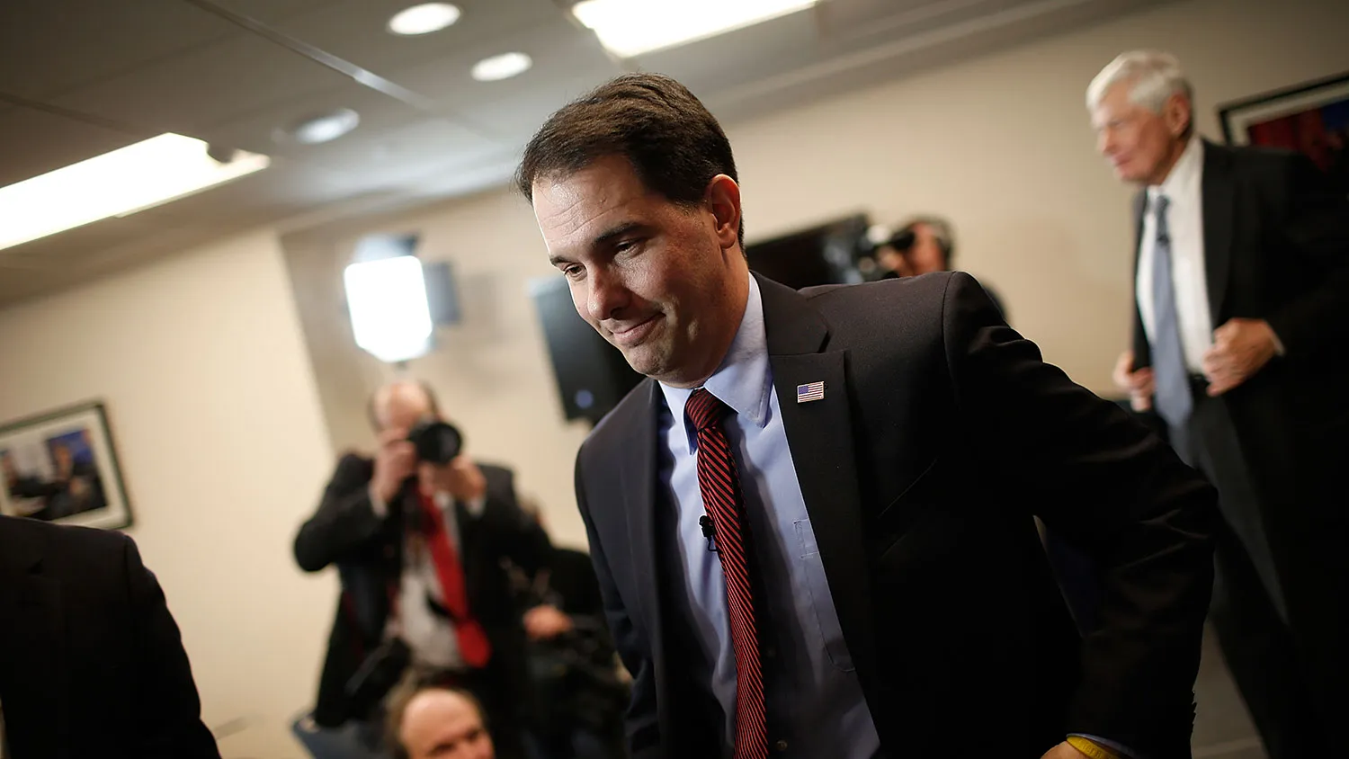 Wisconsin Governor Scott Walker departs after speaking at the American Action Forum January 30, 2015 in Washington, DC.
