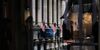 NEW YORK, NEW YORK - DECEMBER 19: People walk by the New York Stock Exchange (NYSE) as the Federal Reserve Board Chairman Jerome Powell holds a news conference on December 19, 2018 in New York City. U.S. stocks fell on Wednesday after the Federal Reserve raised interest rates for the fourth time in 2018. (Photo by Spencer Platt/Getty Images)