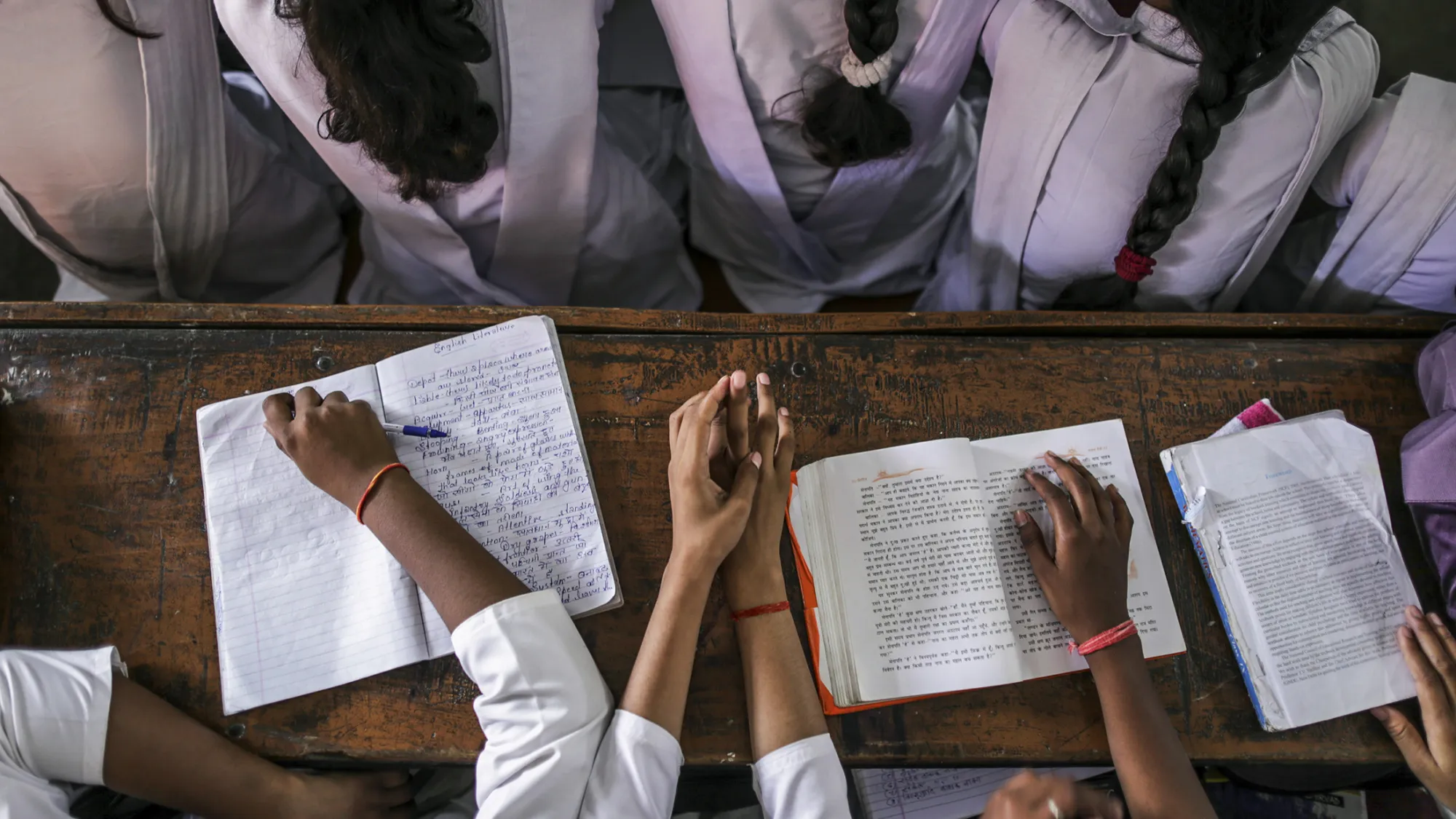 Students sit studying at the Indian Railways Eastern Railway Intermediate College in Mughalsarai, Uttar Pradesh, India, on Thursday, Oct. 1, 2015. The 162-year-old system is Asia's oldest. It not only owns the tracks, train stations and marshalling yards, but schools, hospitals, recreation clubs and hotels for its staff. Sometimes, as in the case of Mughalsarai, entire cities grew as an extension of British rail infrastructure.
