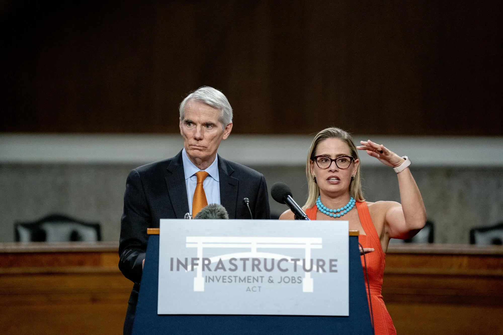 Senators Rob Portman and Kyrsten Sinema during a news conference in Washington, D.C. on July 28.