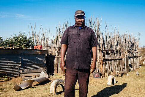 Bongani Nkala outside his home.