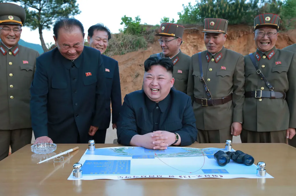 Why is this man smiling?
