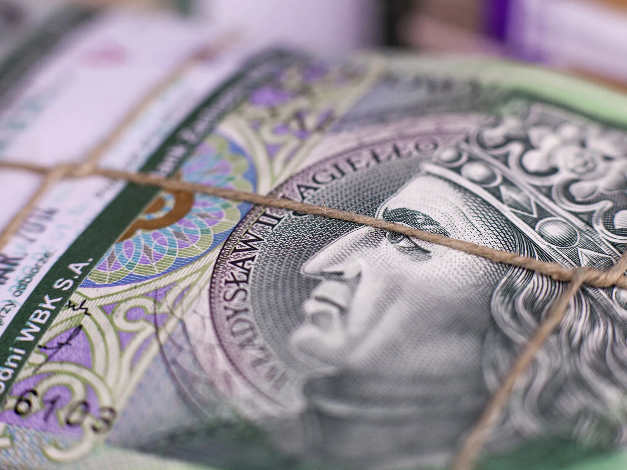 Bundles of 100 zloty banknotes.