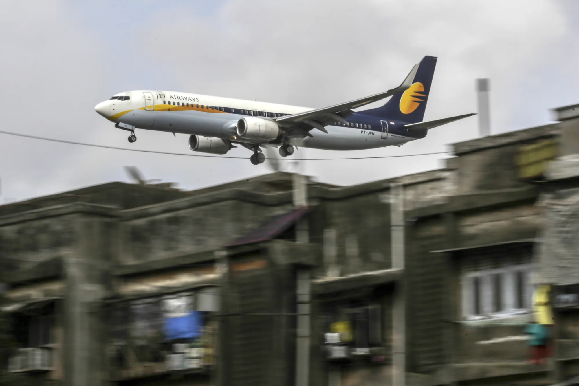 A Jet Airways aircraft prepares to land at Chhatrapati Shivaji International Airport in Mumbai.