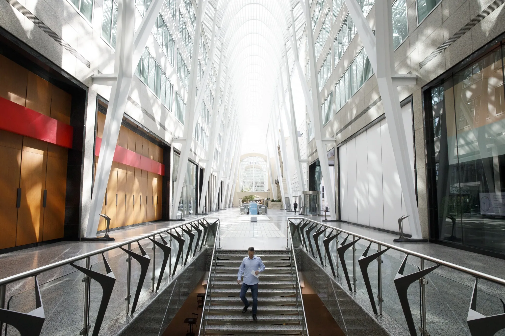 A pedestrian walks through a nearly empty Brookfield Place in the financial district of Toronto on May 22.
