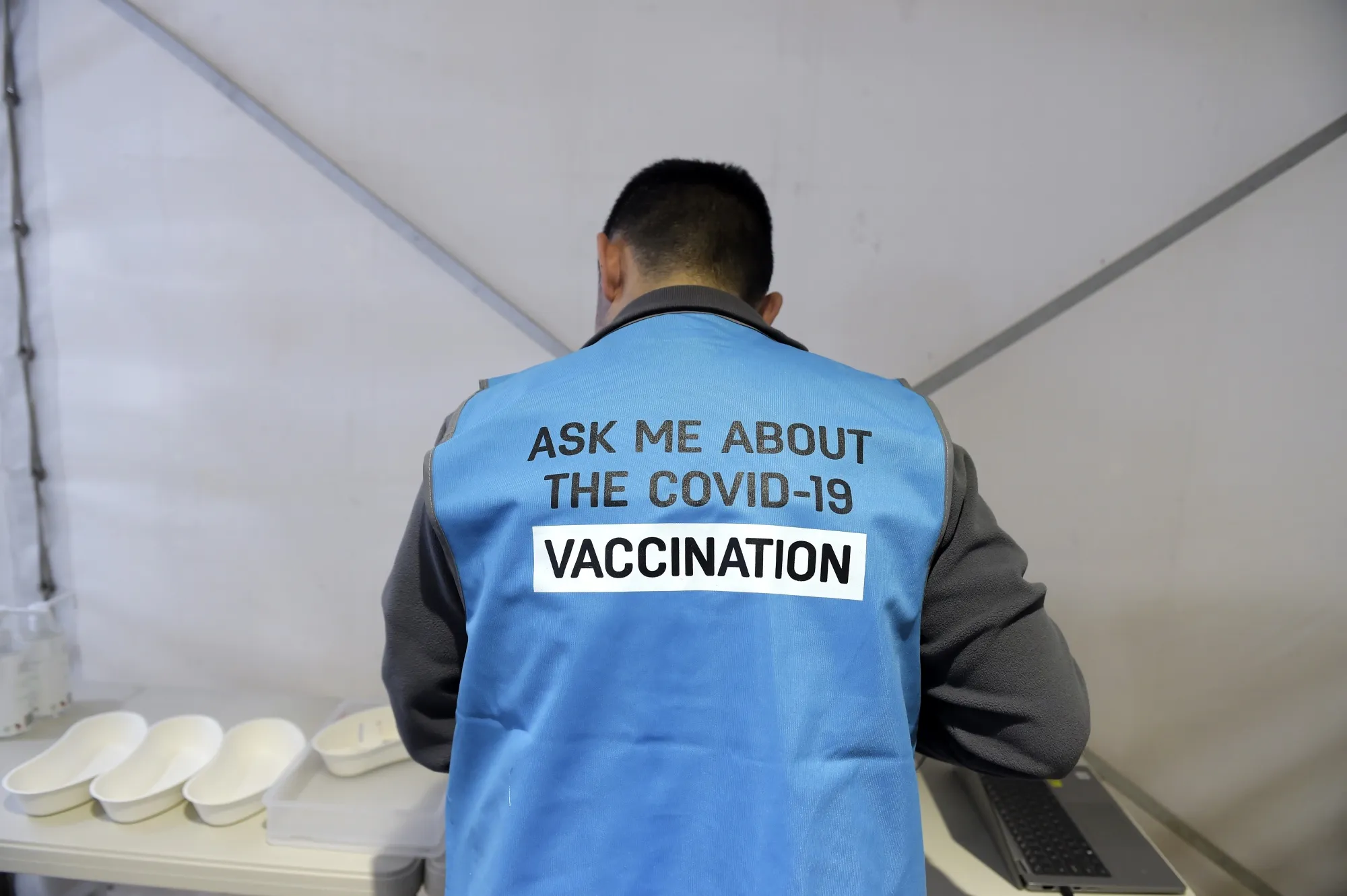 A pharmacist works at a drive-thru Covid-19 vaccination hub in Melbourne, Australia.