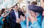 Sebastian Kurz, Austria's foreign minister and leader of the People's Party (OeVP), greets supporters as he arrives during his final campaign event in Vienna on Oct. 13.
