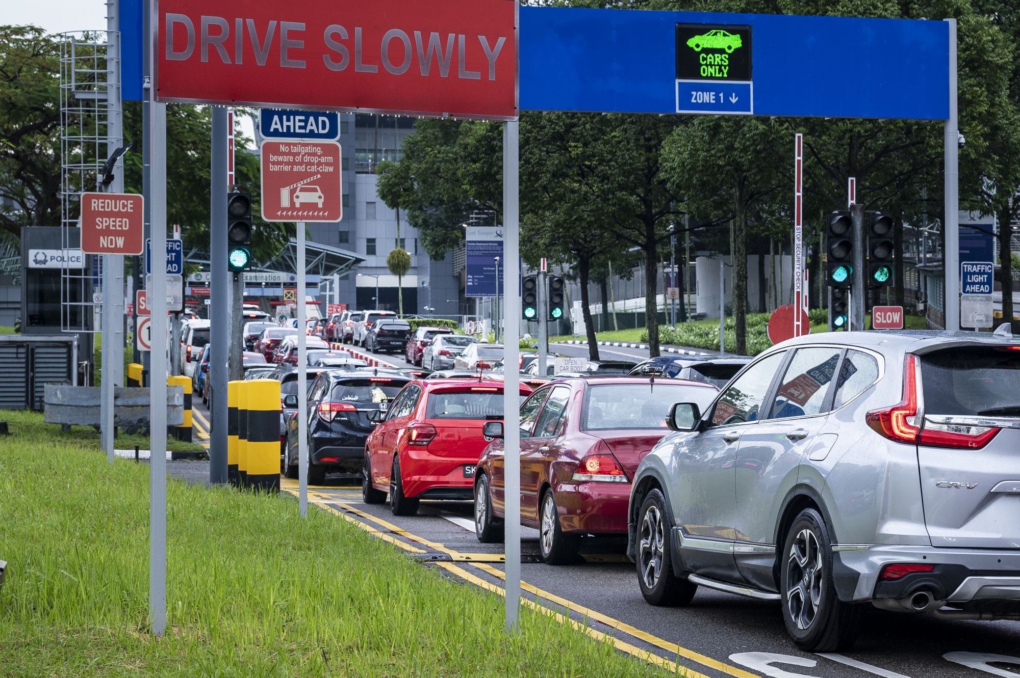 Passport-Free QR Code Travel to Singapore by Car to Start on March 19 -  Bloomberg