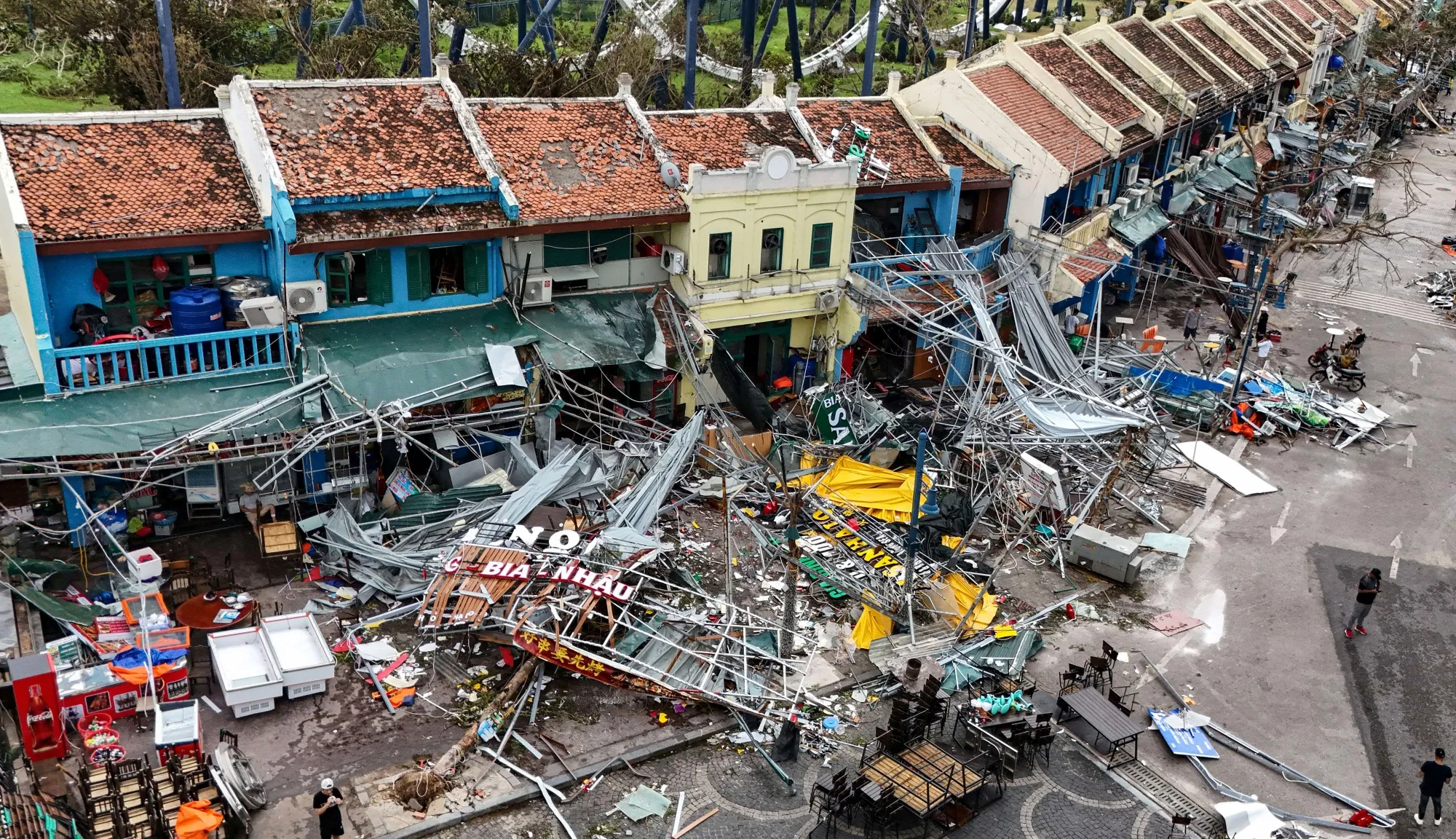 Damaged buildings and debris on a street after Super Typhoon Yagi hit Ha Long, in Quang Ninh province, on Sept. 8.