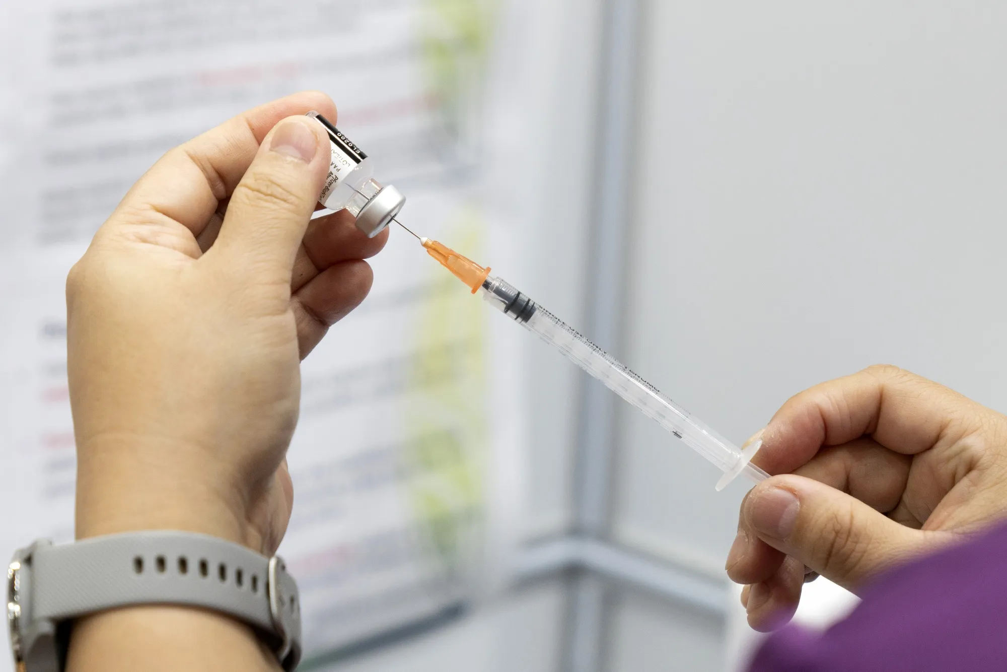 Inoculating Seniors at a Vaccination Center as Singapore is Prioritizing Safely Reopening Its Borders