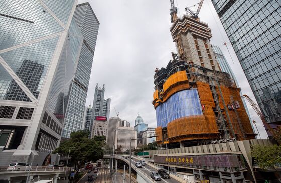 Tycoons Keep Building Hong Kong Offices as Vacancies Jump