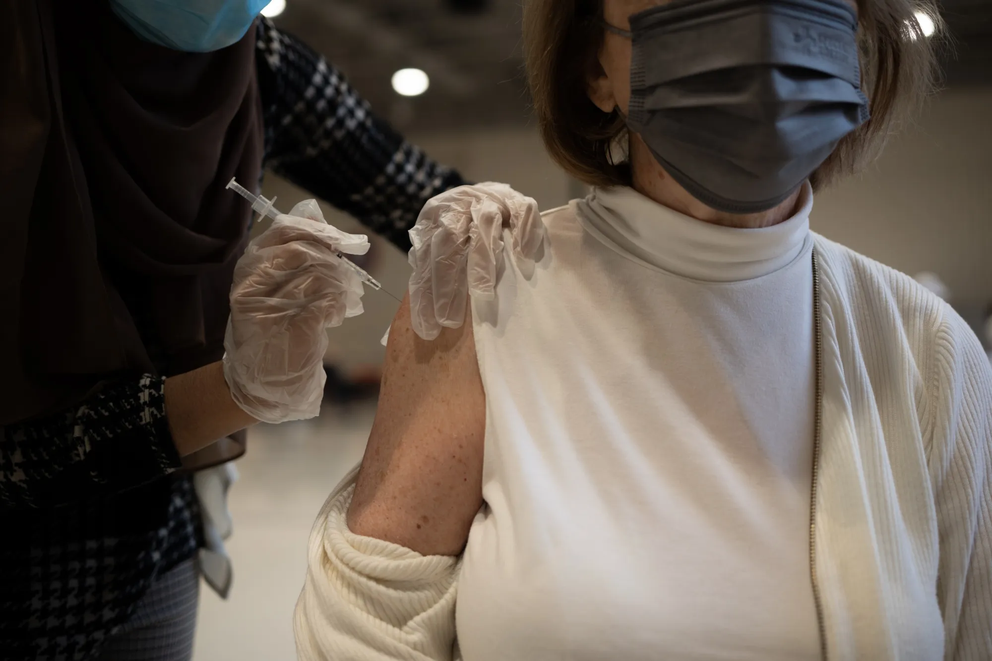 Moderna and Pfizer are working on new versions of their vaccines that will specifically target the highly contagious omicron variant.