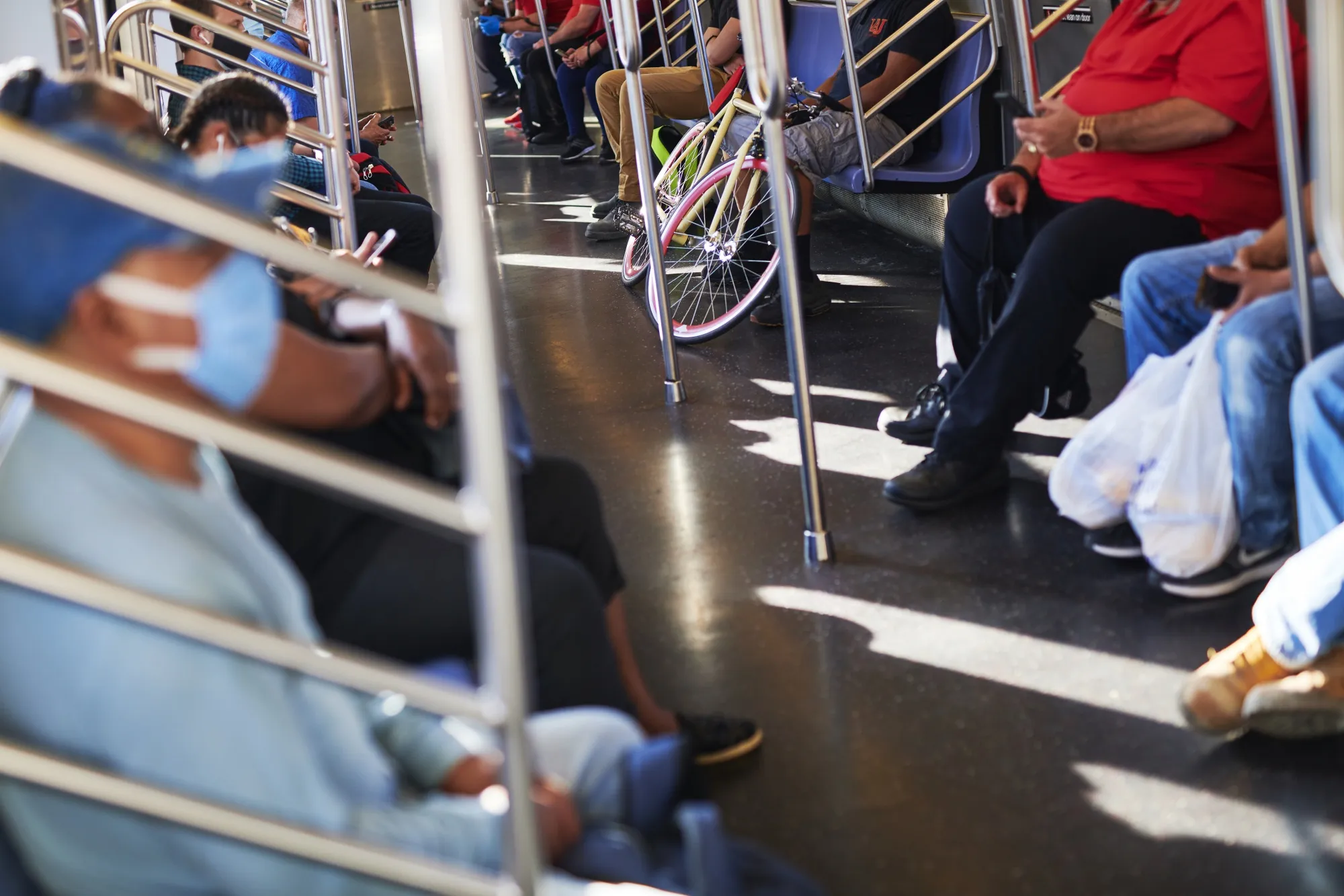 Commuters ride a subway from the Marcy Avenue subway station during morning rush hour in the Brooklyn borough of New York on June 22.