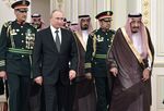 Vladimir Putin, second from left, and Saudi King Salman bin Abdulaziz, right, in Riyadh in 2019. 