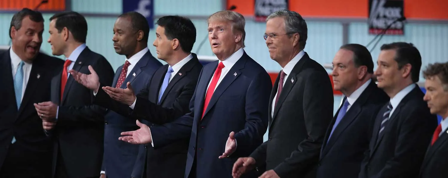 CLEVELAND, OH - AUGUST 06: Republican presidential candidates (L-R) New Jersey Gov. Chris Christie, Sen. Marco Rubio (R-FL), Ben Carson, Wisconsin Gov. Scott Walker, Donald Trump, Jeb Bush, Mike Huckabee, Sen. Ted Cruz (R-TX) and Sen. Rand Paul (R-KY) take the stage for the first prime-time presidential debate hosted by FOX News and Facebook at the Quicken Loans Arena August 6, 2015 in Cleveland, Ohio. The top-ten GOP candidates were selected to participate in the debate based on their rank in an average of the five most recent national political polls. (Photo by Scott Olson/Getty Images)
