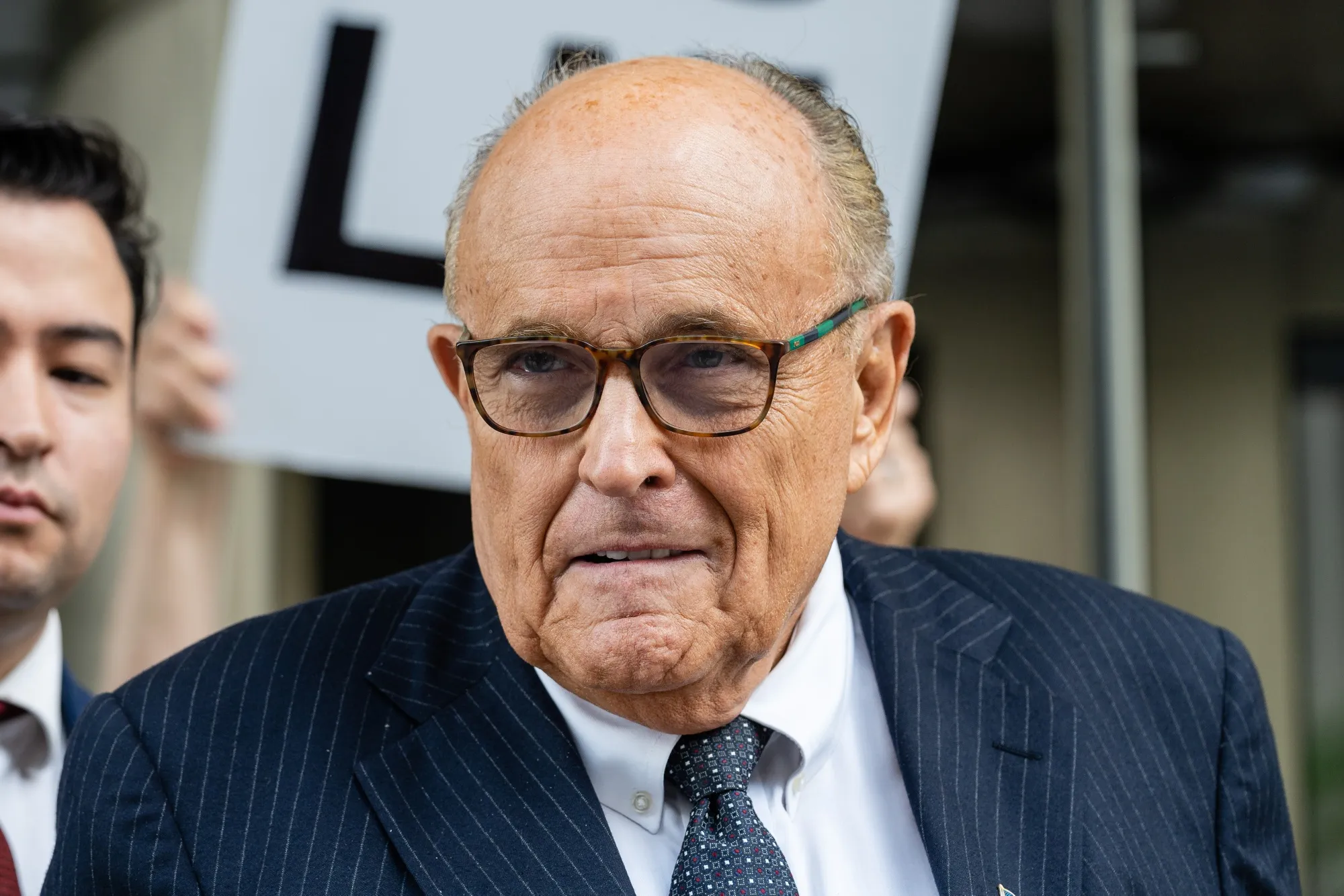 Rudy Giuliani exits federal court in Washington, DC,&nbsp;on&nbsp;May 19.