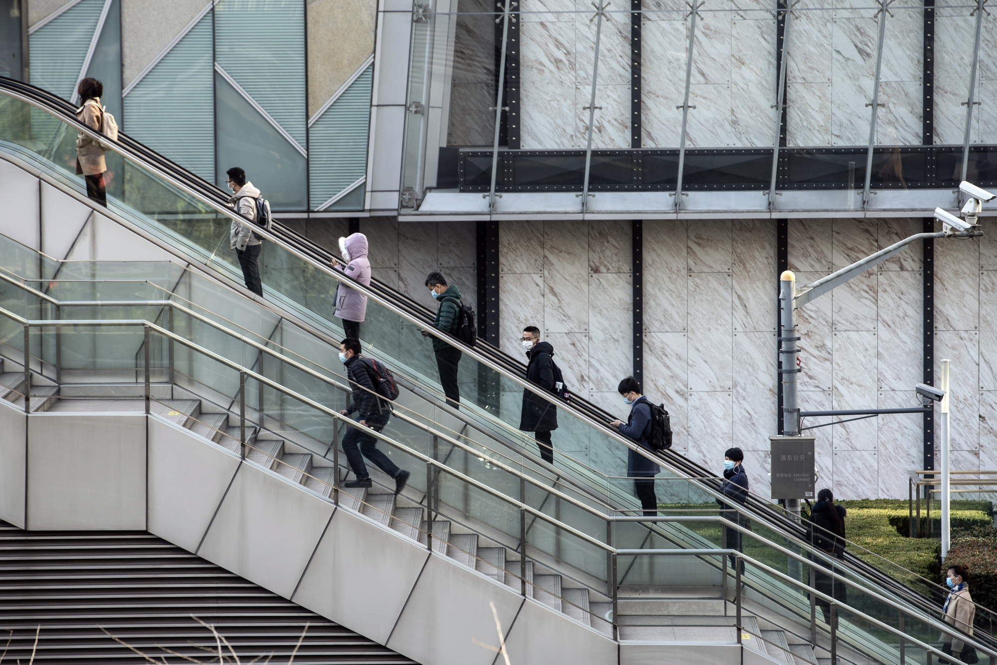 Travelers in Shanghai as Chinese stocks make strong start to near-peak New Year cheats