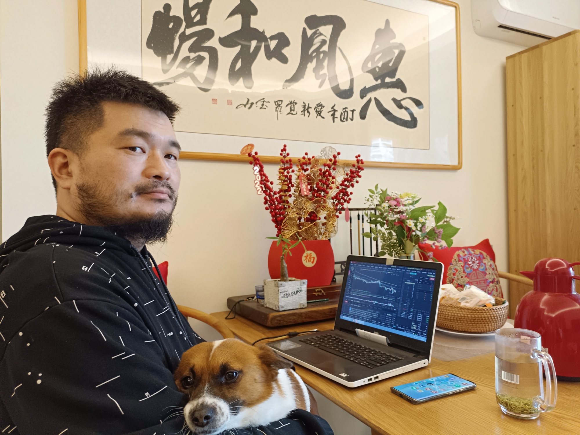 Clawde Yin, here&nbsp;with his dog at his home in Shanghai, is concerned about what&nbsp;snap government policy changes would do to his savings in real estate or stocks.