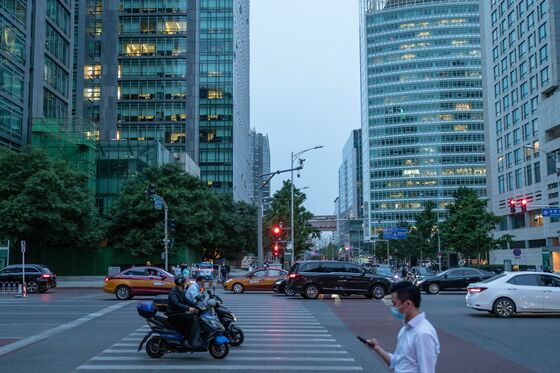 Inside the Race to Avert Disaster at China’s Biggest ‘Bad Bank’