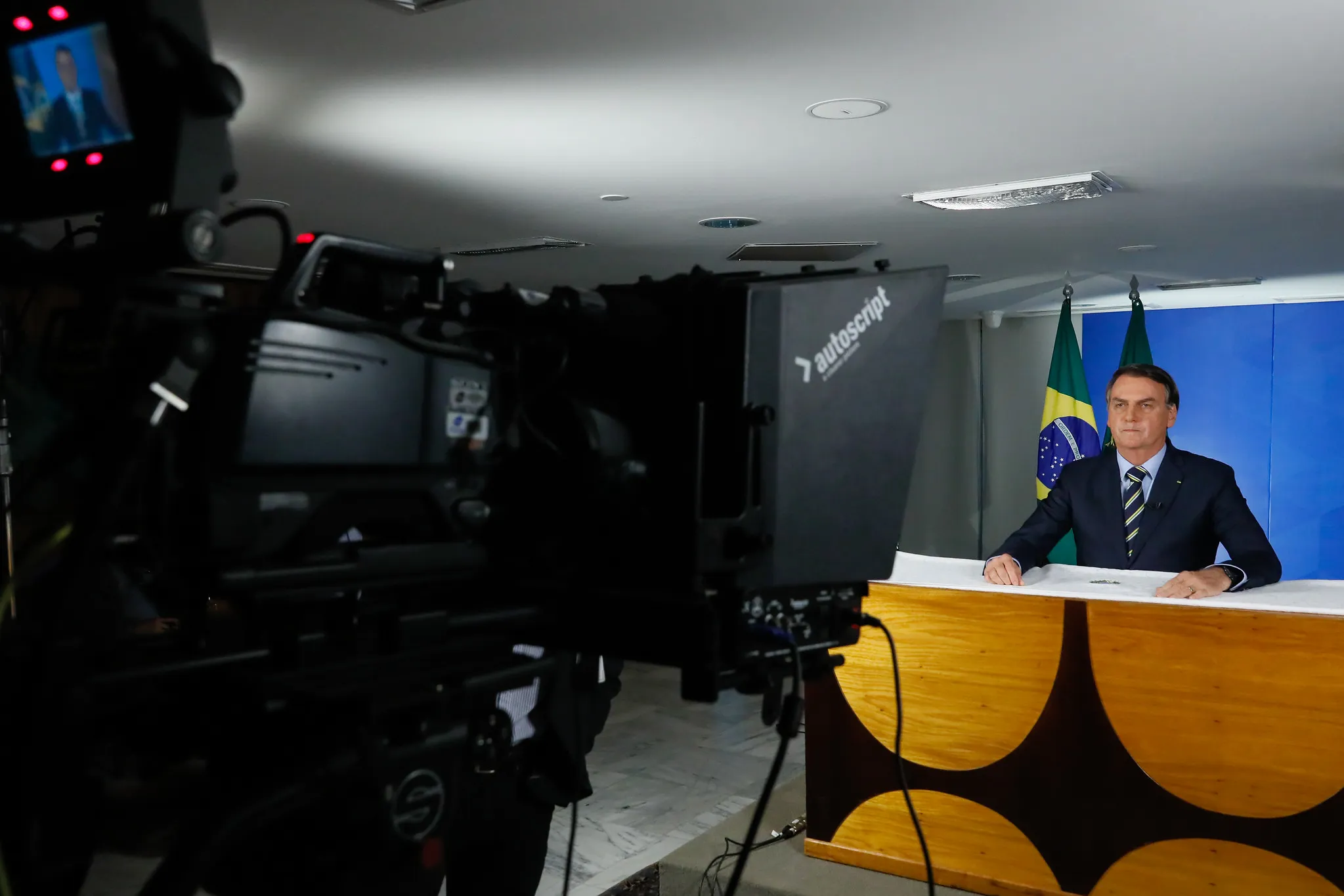 Jair Bolsonaro gives a televised address from the&nbsp;Palacio do Planalto in&nbsp;Brasília, Brazil, on March 24.