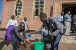 Parishioners wash hands as a preventive measure against the spread of the Covid-19 coronavirus at a church&nbsp;in Lilongwe on March 22.