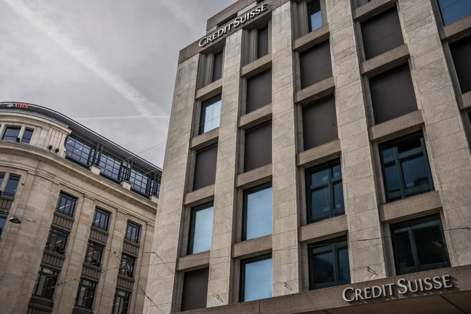 A UBS&nbsp;office, left, alongside a Credit Suisse&nbsp;office in Geneva, Switzerland.