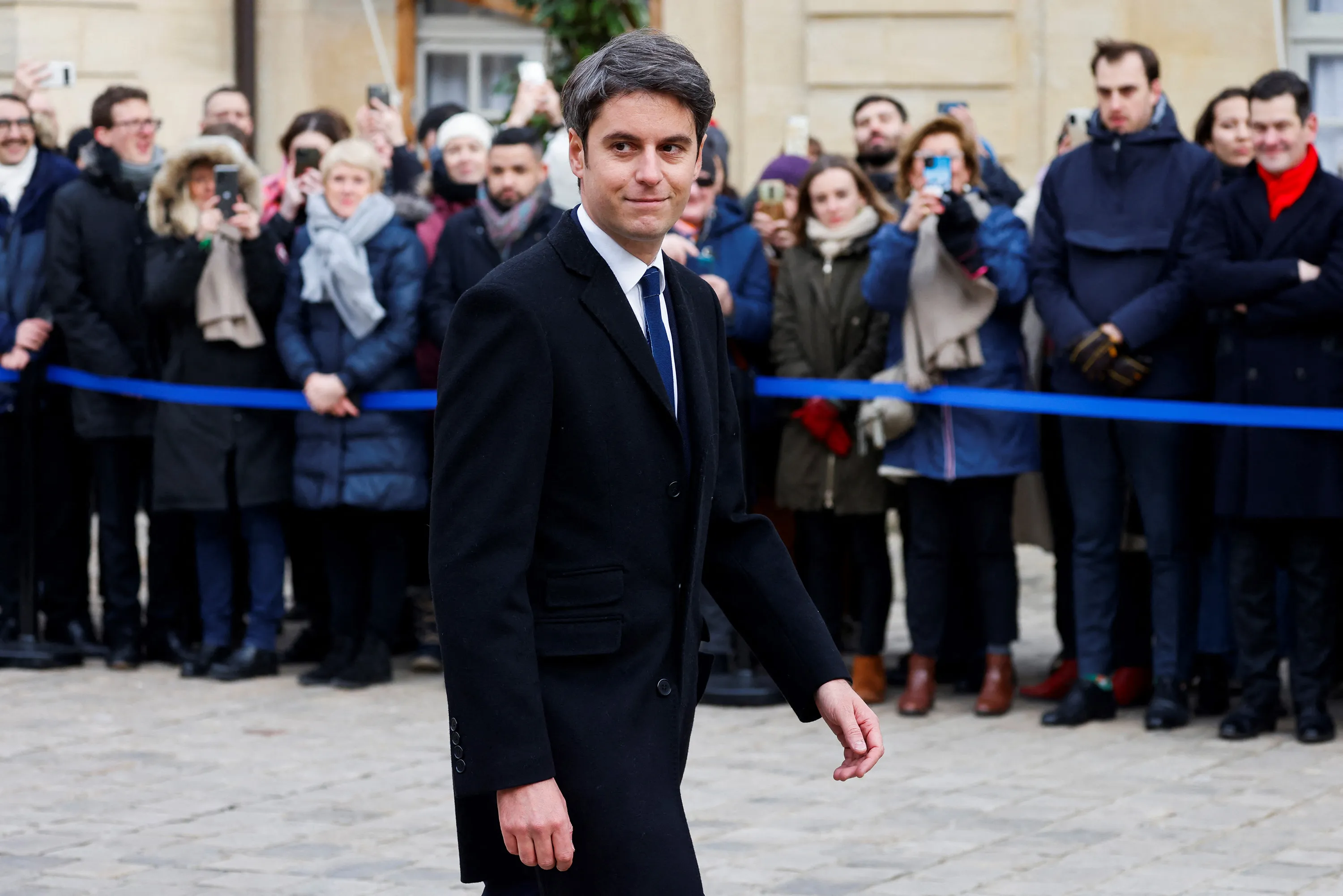 Gabriel Attal arrives for the handover ceremony at the Hotel Matignon, in Paris.