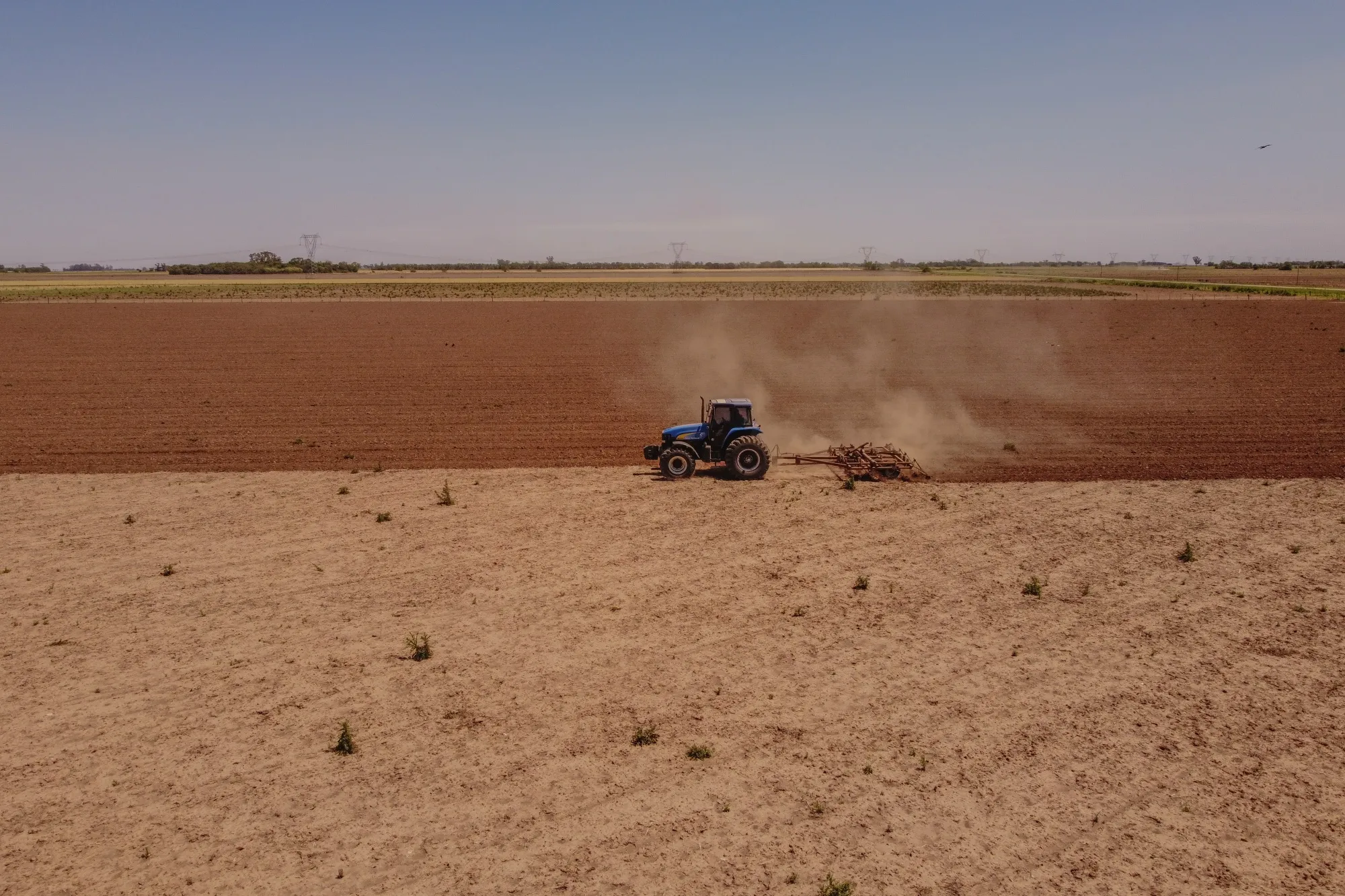 A farmer prepares a field in Argentina for planting soybeans. Startup Lithos Carbon uses spreads crushed rocks on farmland that can help speed the uptake of CO2 and restore soil.