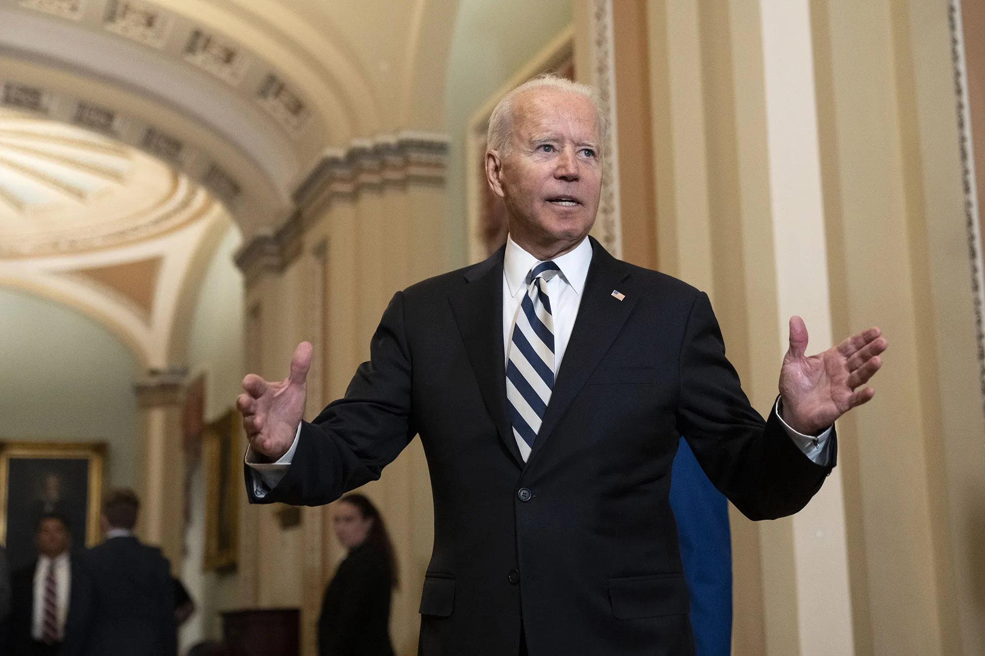 Joe Biden speaks to reporters after reaching&nbsp;a&nbsp;reconciliation package overnight that would expand Medicare benefits,&nbsp;at the U.S. Capitol, on July 14.