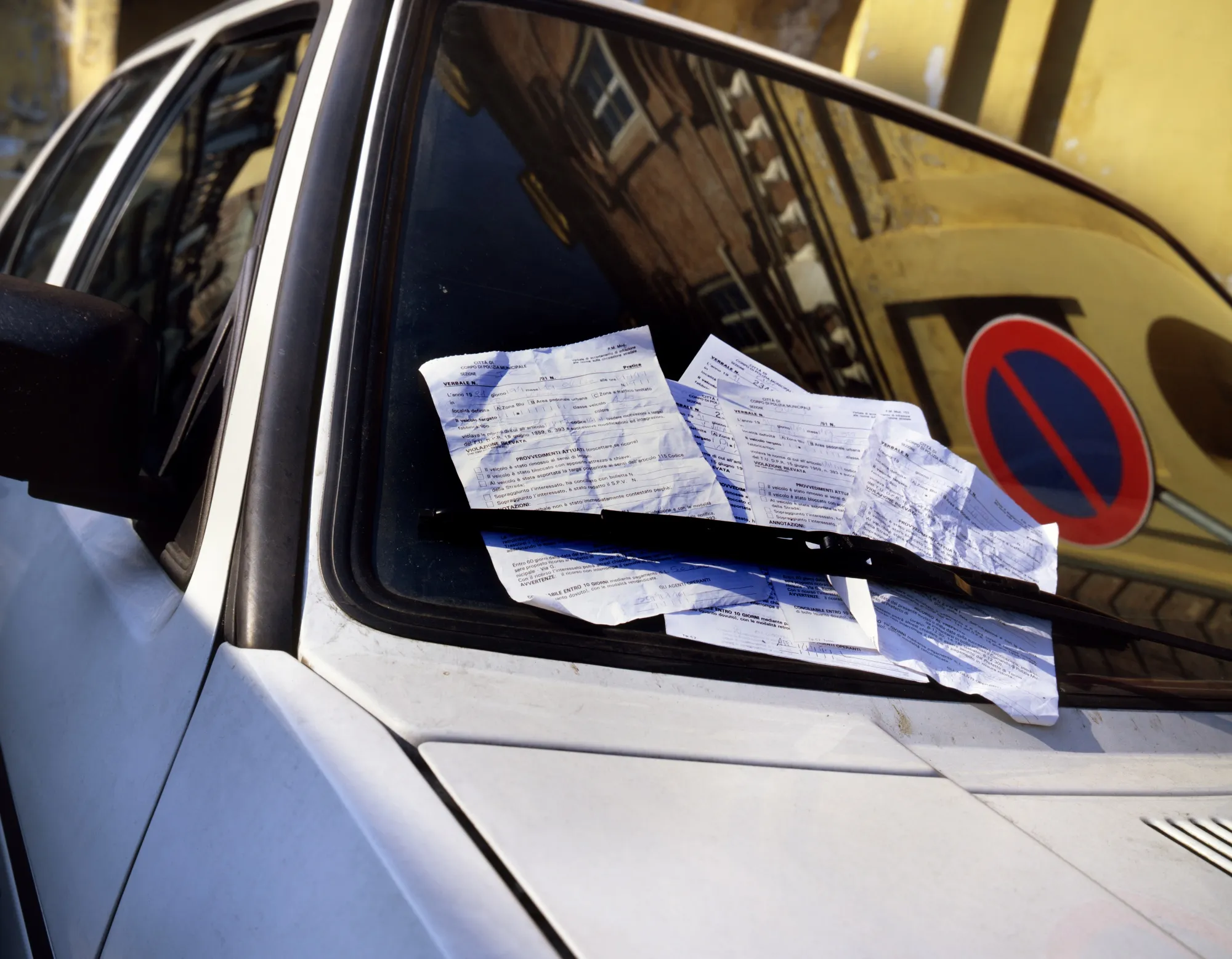 Parking infractions are among the types of offenses that disproportionately saddle people of color in Seattle with fines.&nbsp;