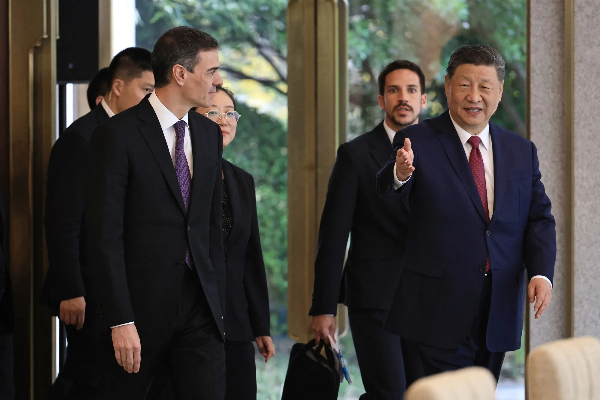 Xi Jinping and Pedro Sanchez before a bilateral meeting in Beijing in April 11.