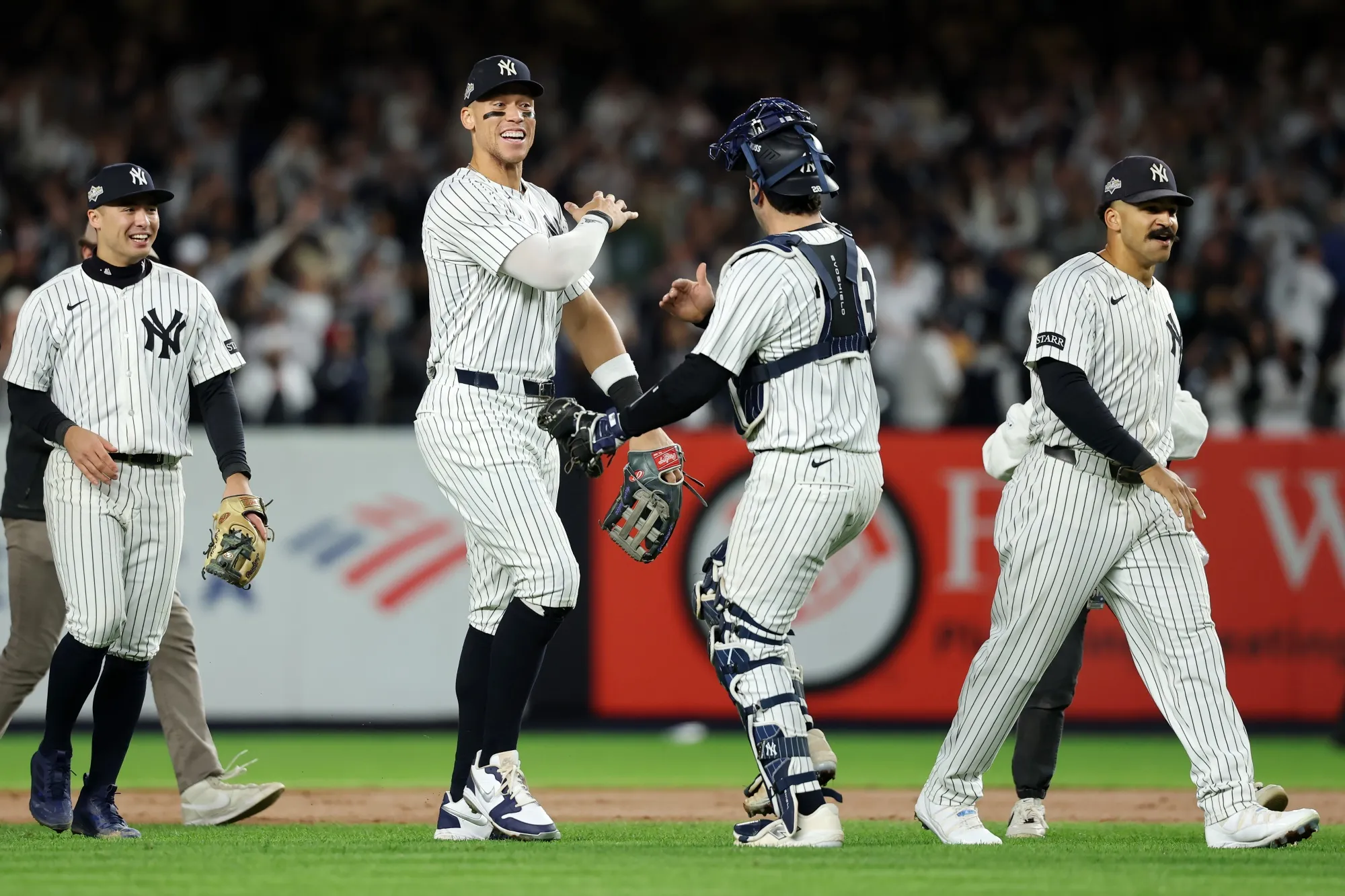 New York Yankees celebrate after beating the Boston Red Sox in game three of the American League Wild Card Series at Yankee Stadium in New York on Oct. 2.&nbsp;