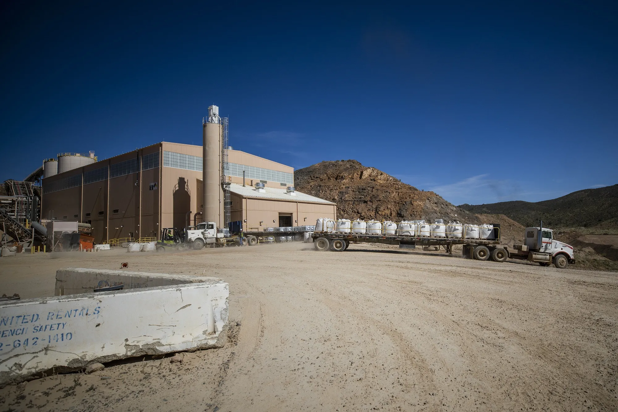 A truck moves bags of rare earth concentrates at a mine operated by MP Materials Corp.&nbsp;in Mountain Pass, California.