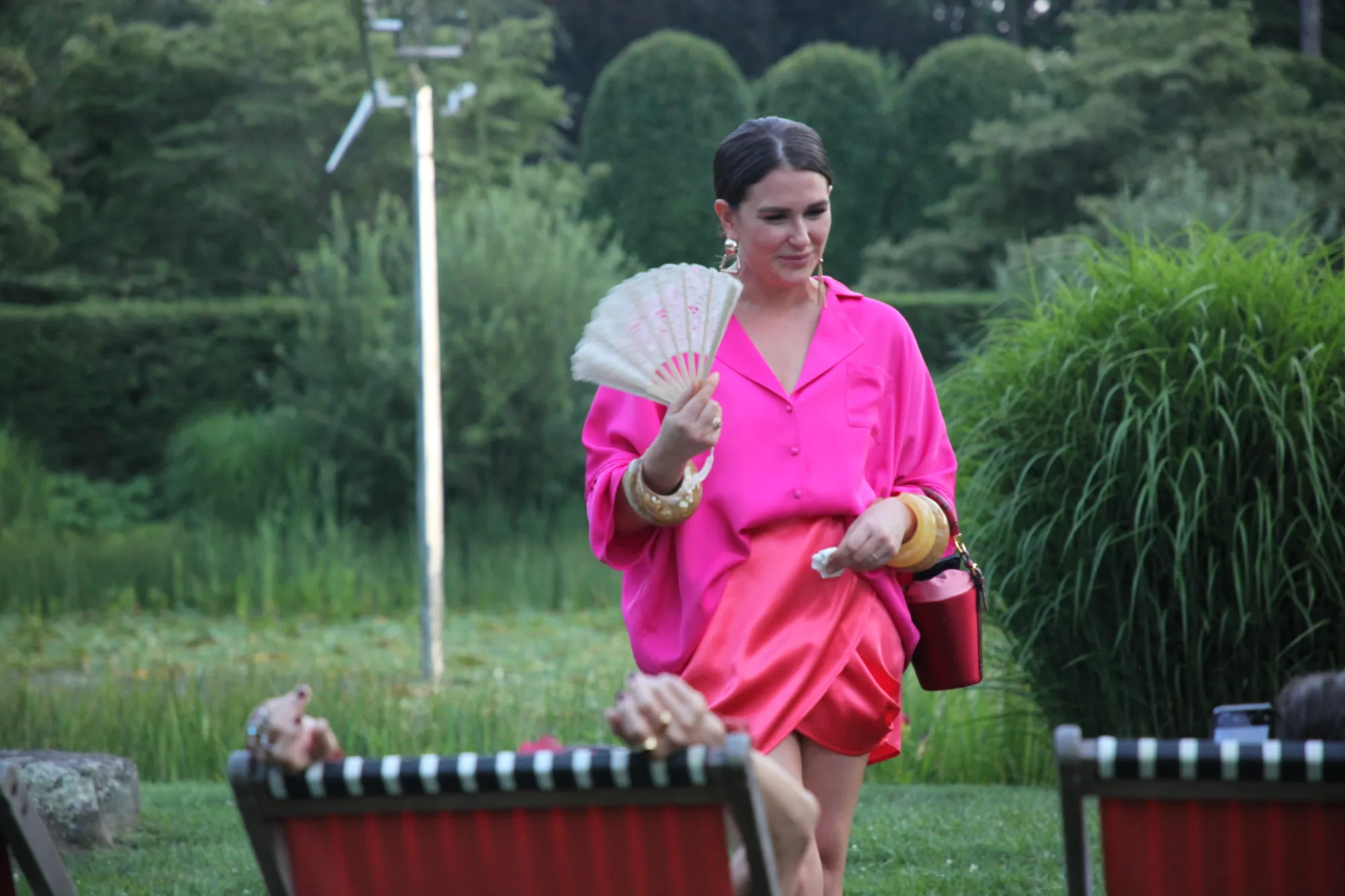 Stylist Rebecca Lambeze with just the right accessory in a heatwave