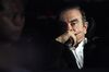 Carlos Ghosn, former chairman of Nissan Motor Co., sits in a vehicle as he leaves his lawyer's office in Tokyo, Japan, on Wednesday, March 6, 2018.