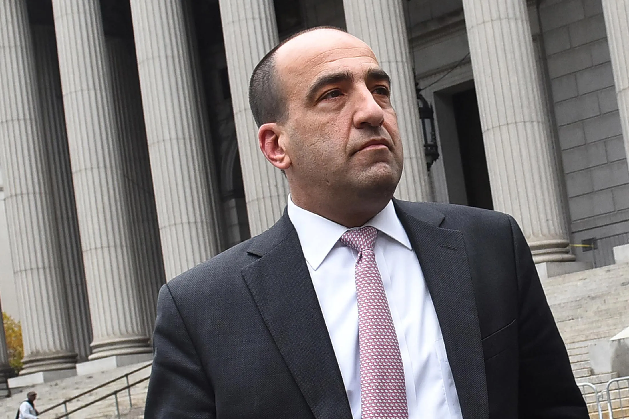 Michael Oppenheim, a former JPMorgan Chase &amp; Co. broker, exits federal court in New York, on, Nov. 5, 2015.
