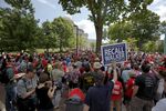 Supporters of the recall election for Governor Scott Walker sing outside of the Wisconsin State Capitol June 5, 2012 in Madison, Wisconsin.
