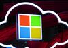 Microsoft Corp. logo, center, hang beside an illuminated iCloud icon at the CeBIT 2017 tech fair in Hannover, Germany.