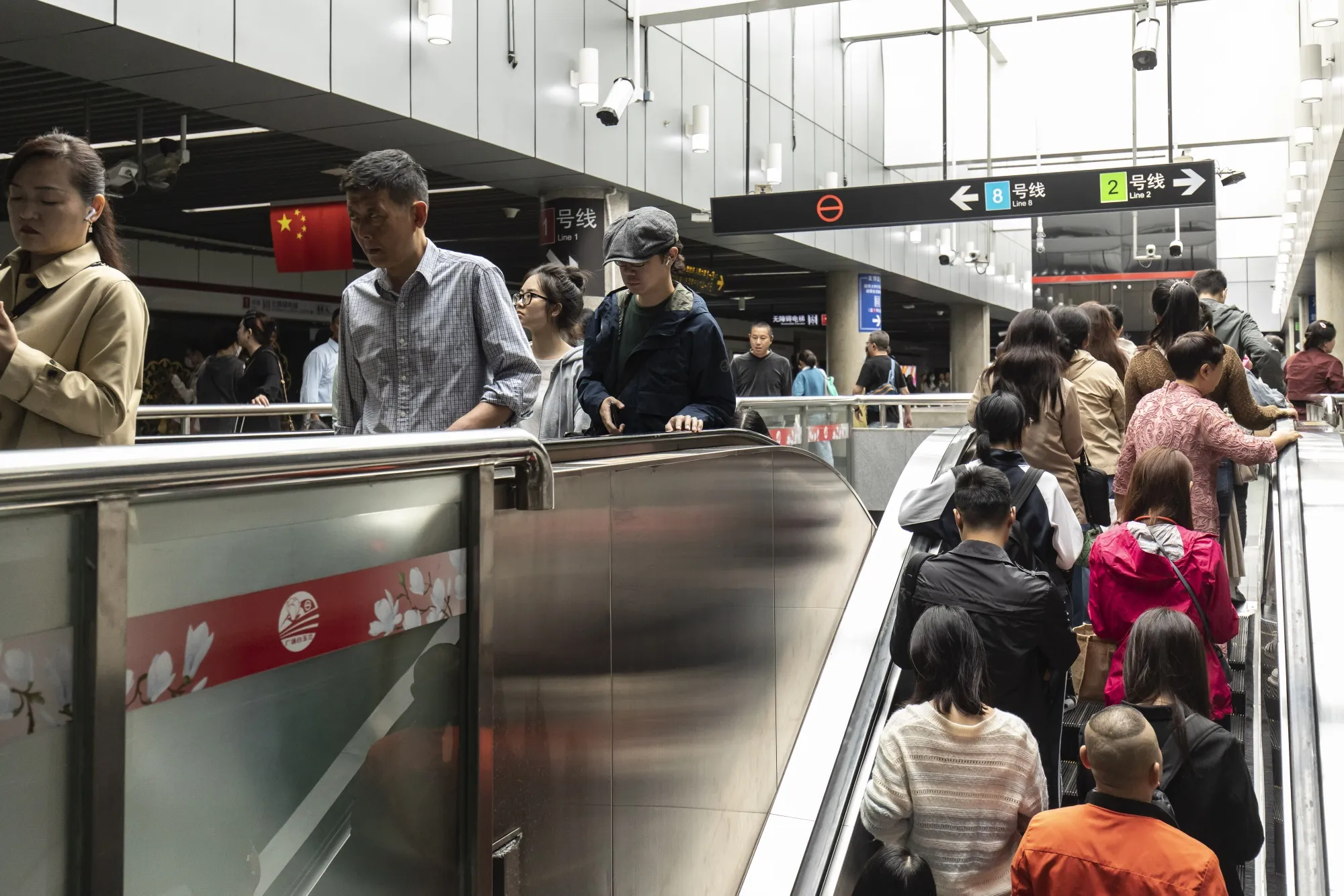 Commuters at a subway station in Shanghai.