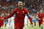 Portugal's Cristiano Ronaldo celebrates his side's opening goal during the group B match between Portugal and Spain at the 2018 soccer World Cup in the Fisht Stadium in Sochi, Russia, Friday, June 15, 2018. (AP Photo/Francisco Seco, File)