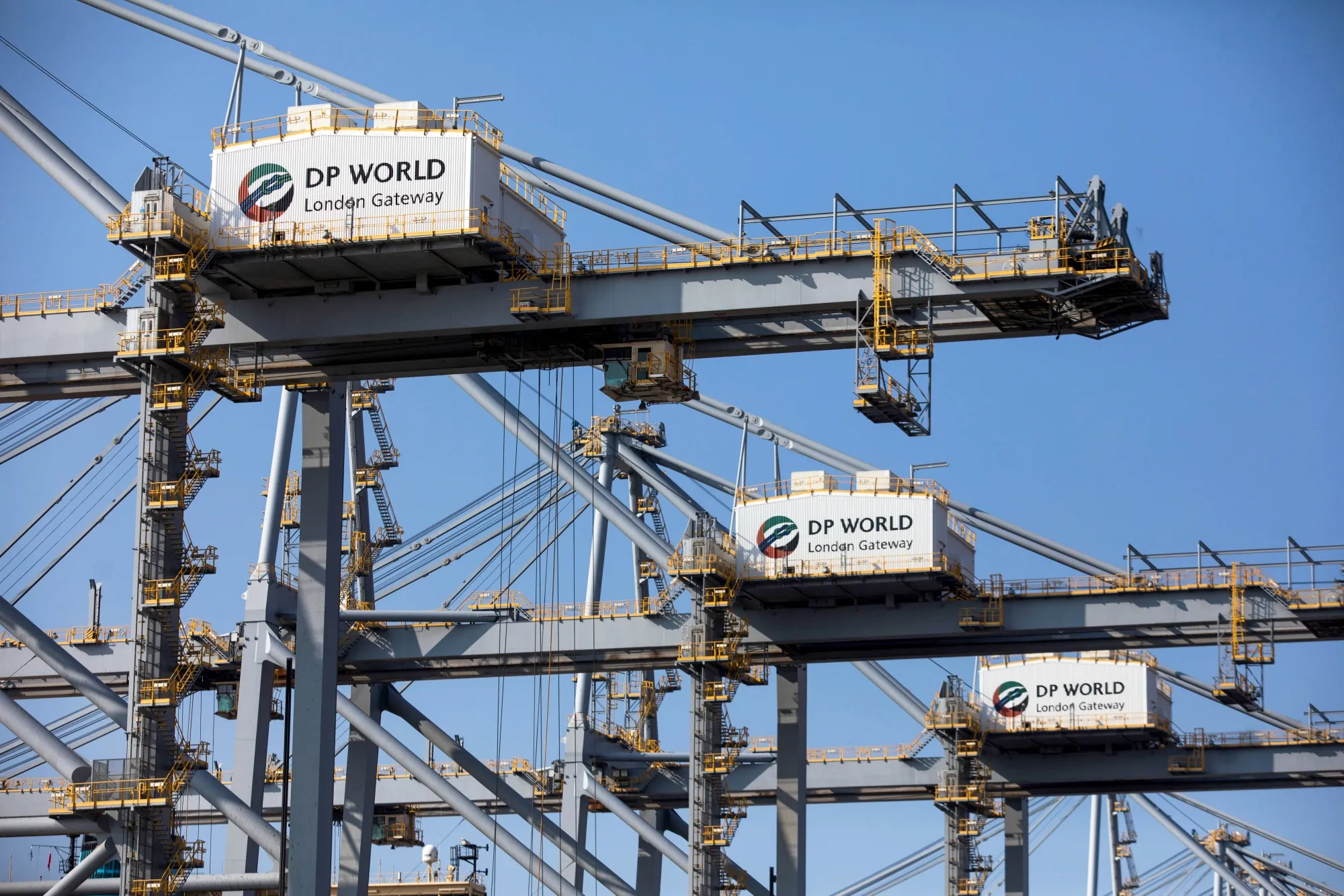 Shipping cranes stand on the dockside at London Gateway port, operated by DP World Plc, in Stanford-le-Hope, UK.&nbsp;