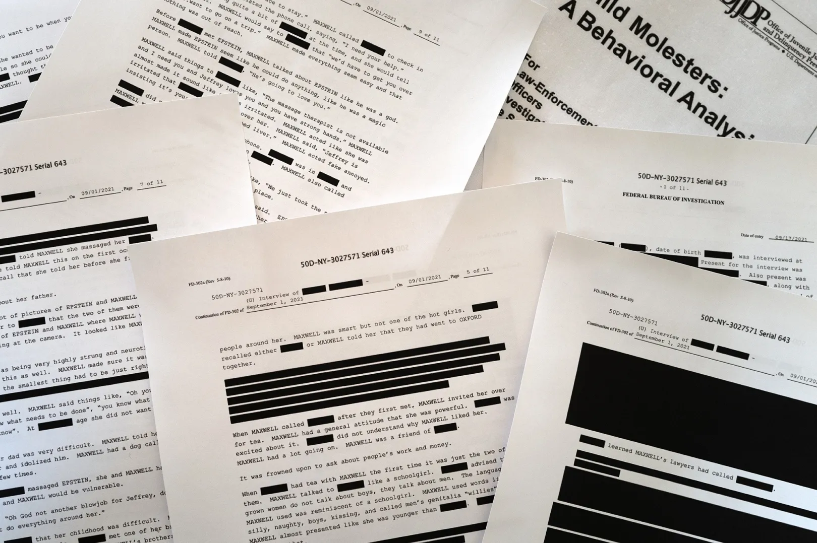 Printouts from the Epstein files released by the Department of Justice.