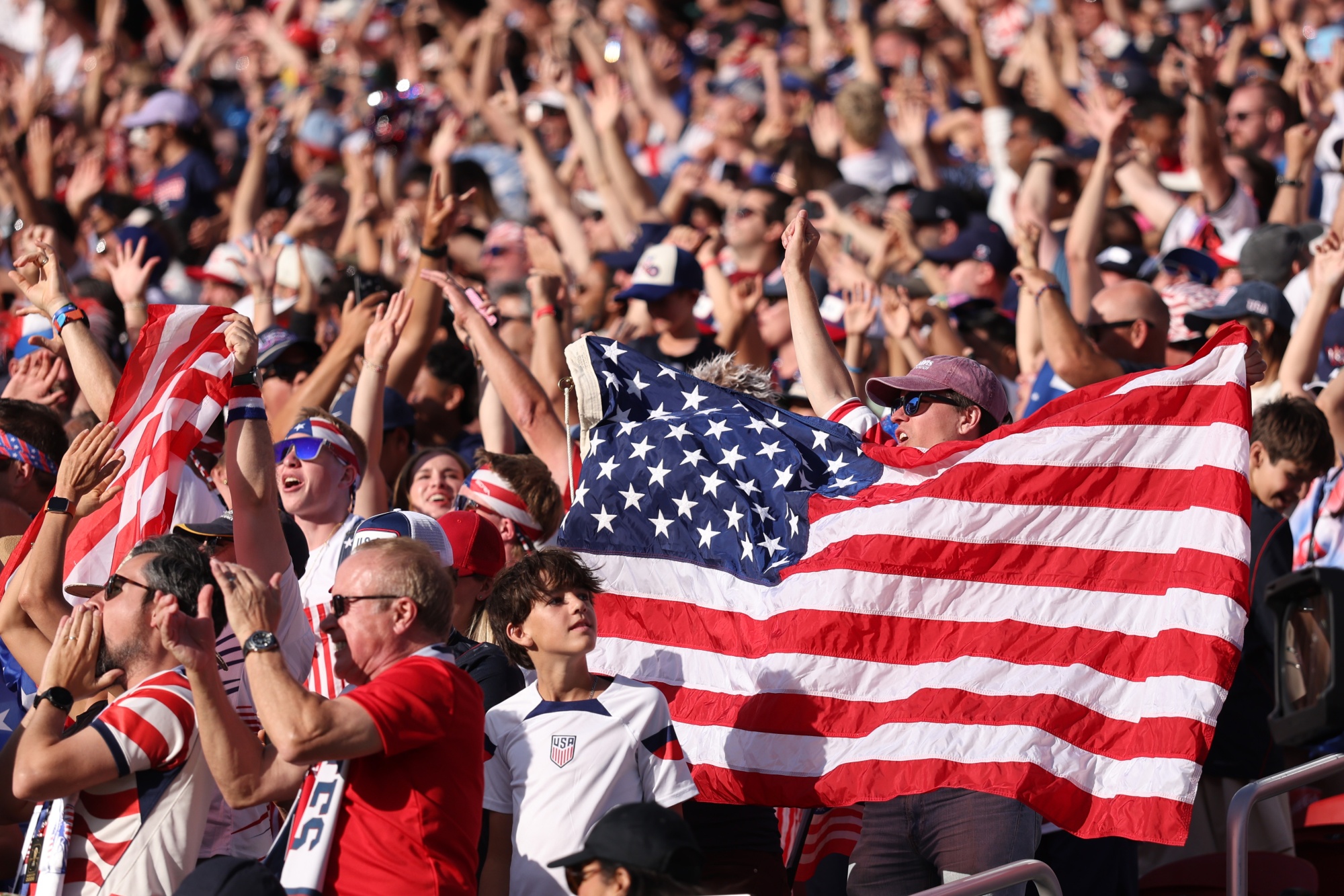 US soccer fans celebrating at the FIFA World Cup 2026.