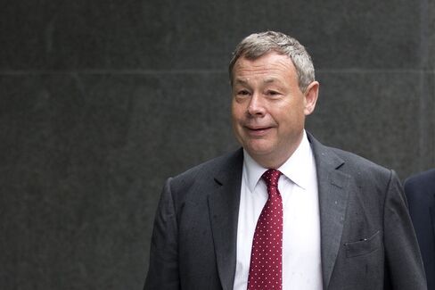 Ian Hannam, a former global chairman of equity capital markets at JPMorgan
Chase & Co., arrives to give evidence at the High Court in London, U.K., on Tuesday, July 2, 2013. Hannam is challenging the Financial Conduct Authority's proposed 450,000-pound civil market-abuse fine for insider trading at a court hearing in London. Photographer: Simon Dawson/Bloomberg *** Local Caption *** Ian Hannam