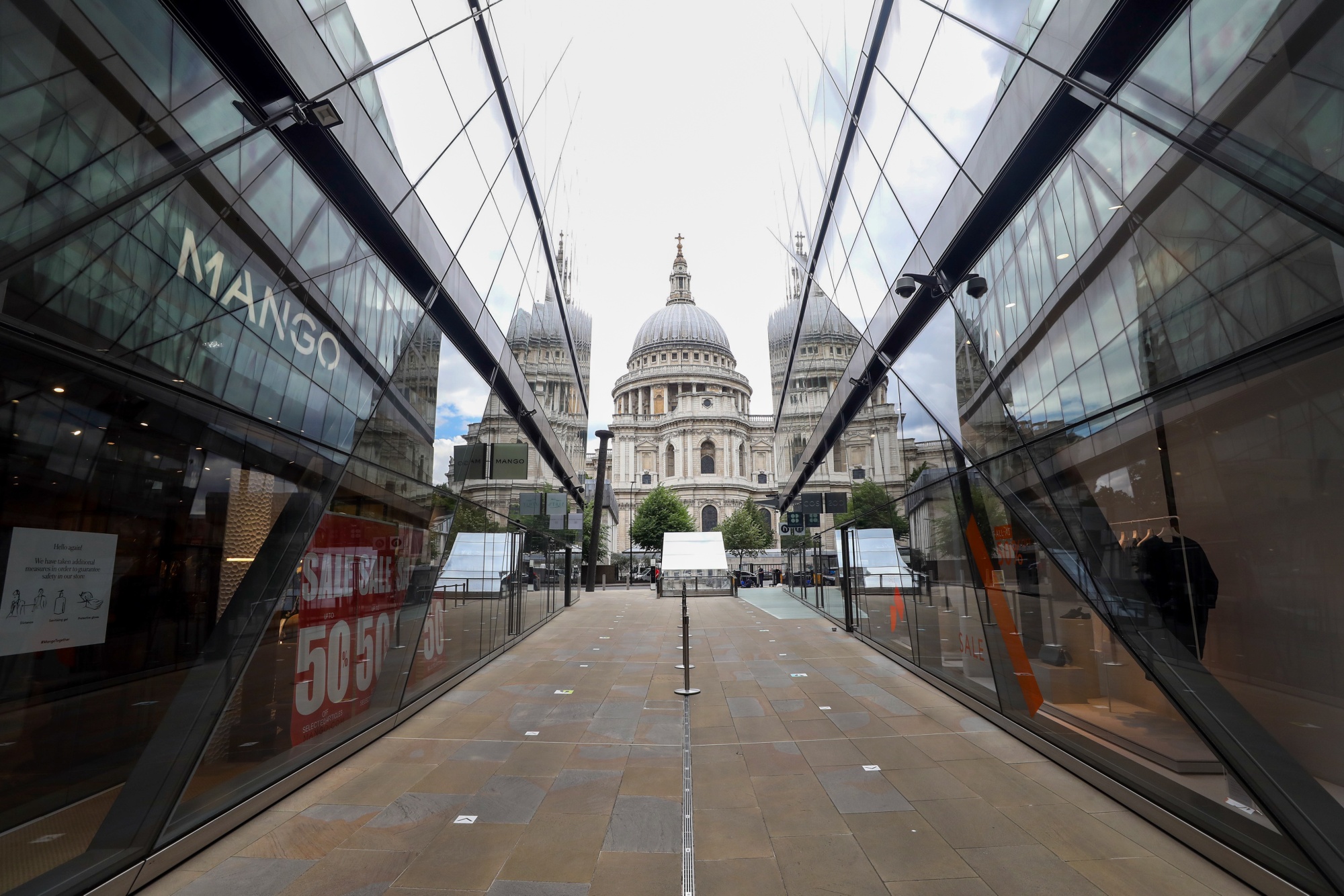 St Paul's cathedral stands at the end of One New Change shopping centre on Cheapside in the City of London.