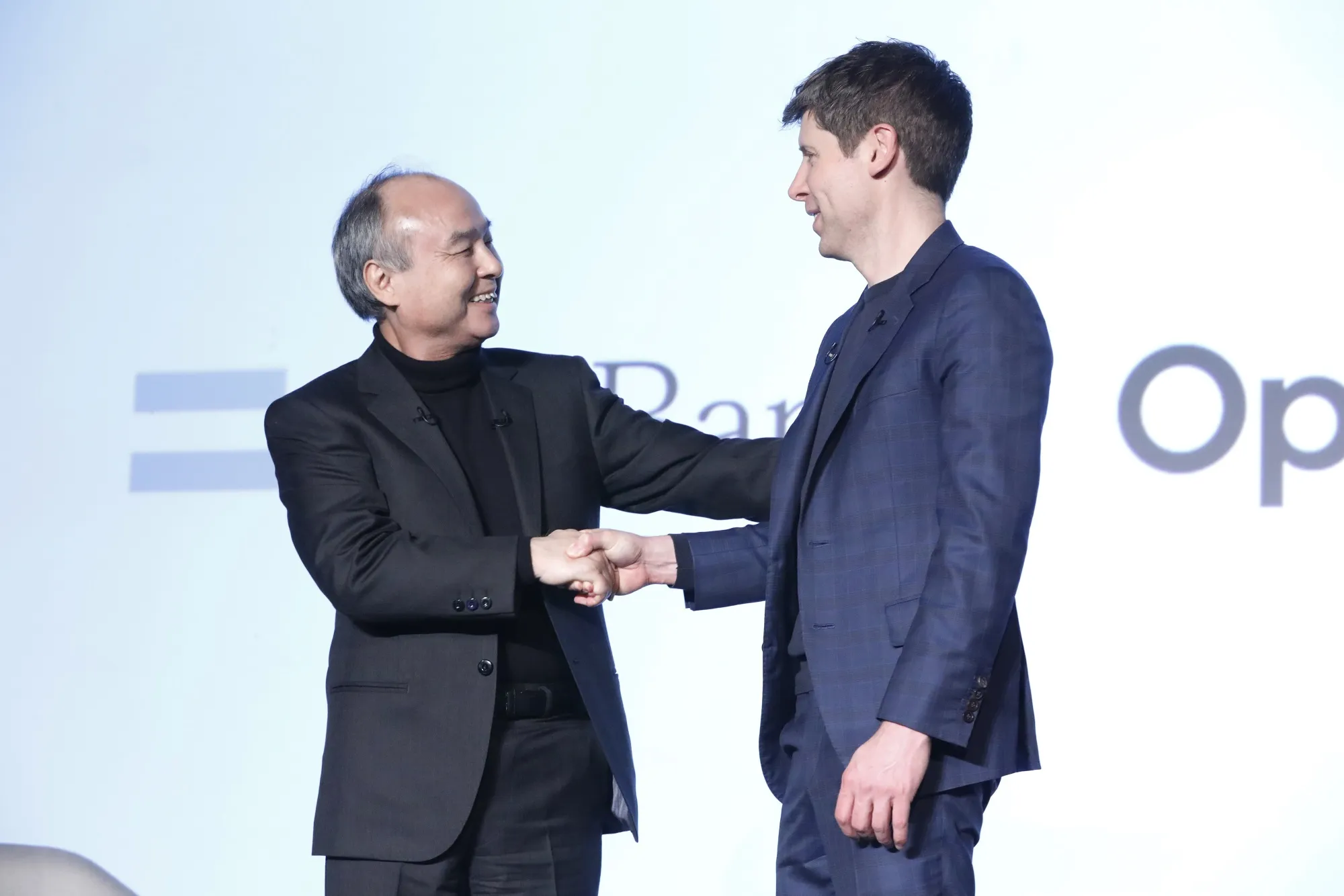 OpenAI&nbsp;CEO Sam Altman, right, and SoftBank Group CEO Masayoshi Son.