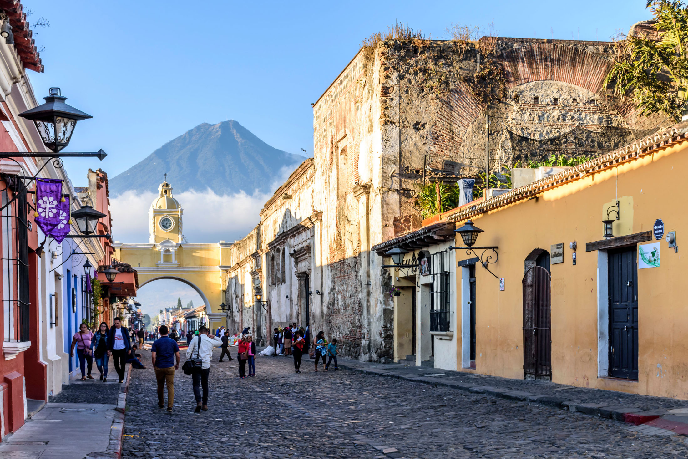 The colorful streets of Antigua offer grand volcano views