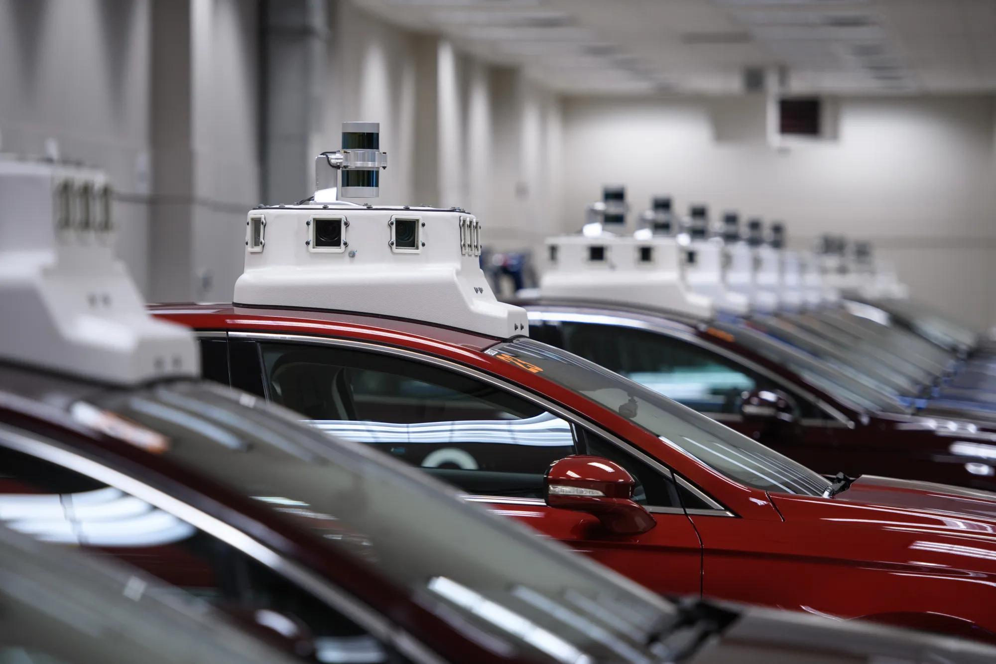 Cameras are seen on the roofs of Argo AI modified Ford Fusion in 2018.