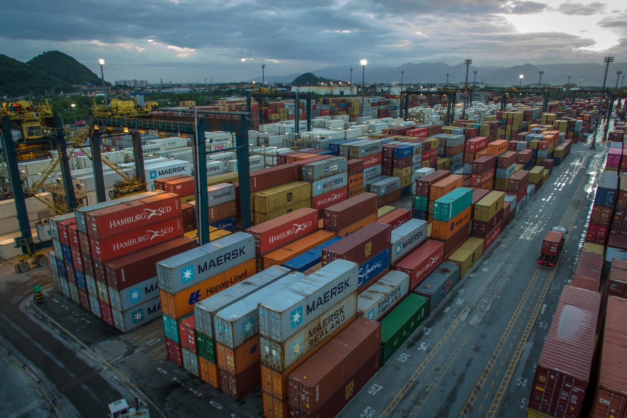 Shipping containers at the BTP export terminal at the Port of Santos in Santos, Brazil, on Tuesday, April 20, 2021. The Brazilian trade ministry released a monthly report indicating that the country posted a trade surplus of $3 billion. Photographer: Jonne Roriz/Bloomberg