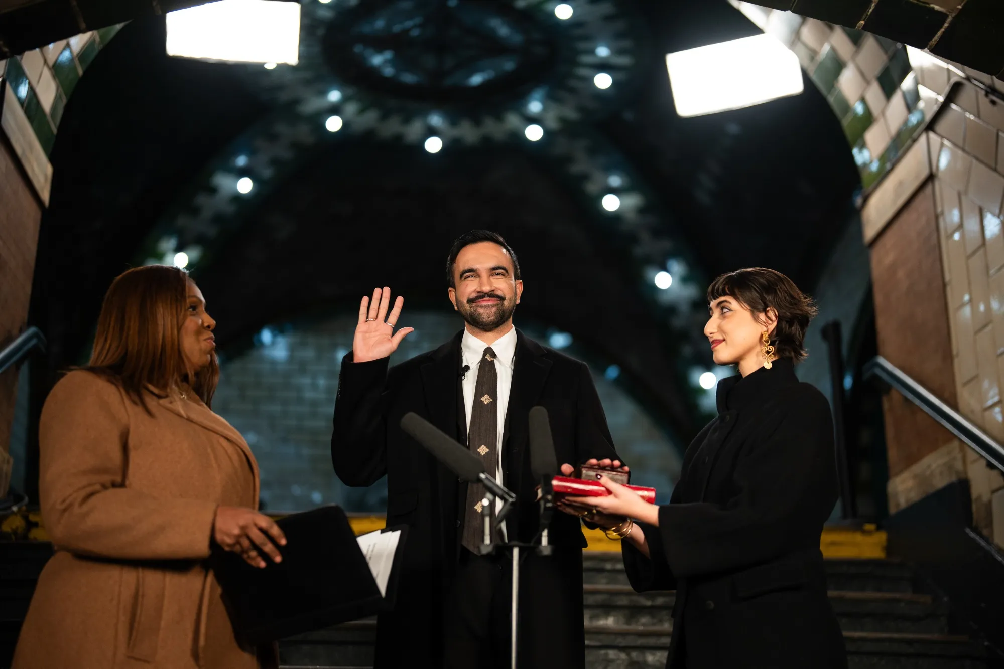 Letitia James, from left, Zohran Mamdani and his wife Rama Duwaji during a swearing-in ceremony at Old City Hall Station in New York, early on Jan. 1.